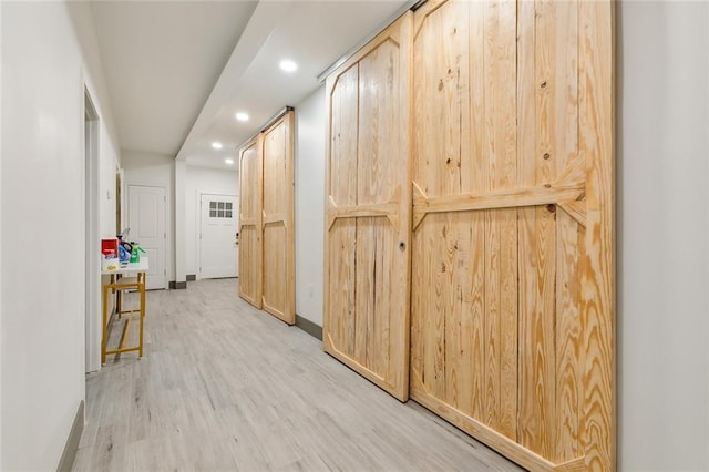 2604 Chartres St, New Orleans, LA 70130 - hall featuring recessed lighting, light wood-type flooring, and baseboards