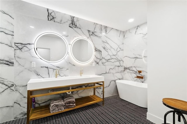 2604 Chartres St, New Orleans, LA 70130 - full bathroom with a soaking tub, tile walls, and vanity