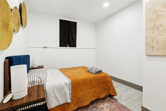 2604 Chartres St, New Orleans, LA 70130 - bedroom with wood finished floors and recessed lighting