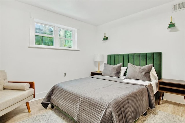 2604 Chartres St, New Orleans, LA 70130 - bedroom with wood finished floors and baseboards
