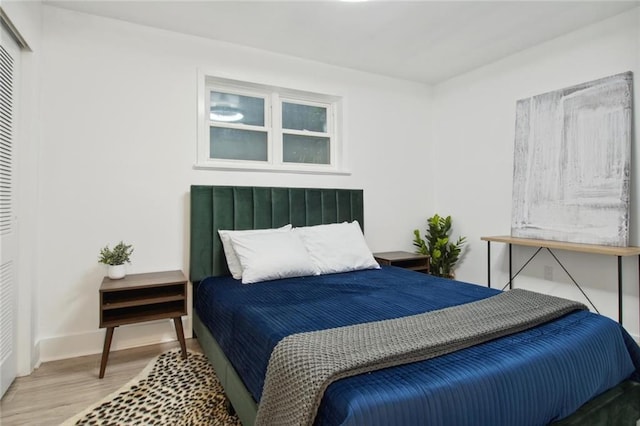 bedroom featuring wood-type flooring