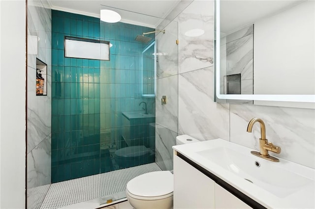 2604 Chartres St, New Orleans, LA 70130 - bathroom with a stall shower, toilet, tile walls, and vanity