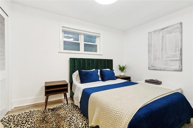 2604 Chartres St, New Orleans, LA 70130 - bedroom with wood finished floors and baseboards