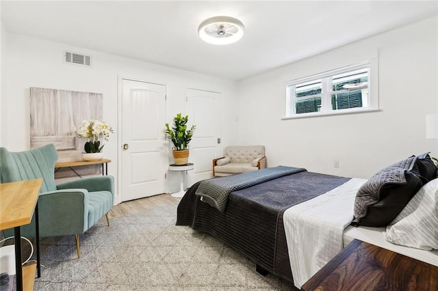 2604 Chartres St, New Orleans, LA 70130 - bedroom with light wood-type flooring