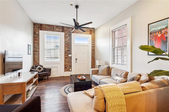 living room with ceiling fan, french doors, and dark wood-type flooring