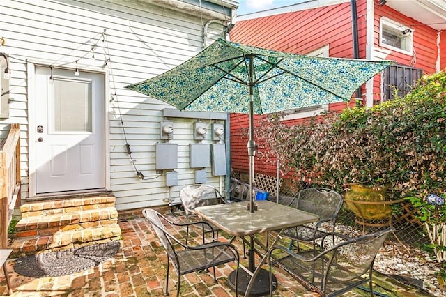 1512 Saint Ann St, New Orleans, LA 70116 - view of patio with entry steps and outdoor dining area