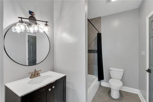 full bathroom with toilet, vanity, tile patterned flooring, and shower / bath combo with shower curtain