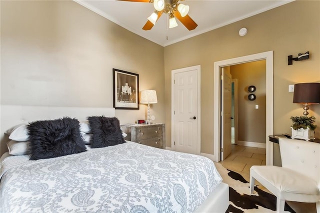 bedroom with ceiling fan, light tile patterned floors, and ornamental molding