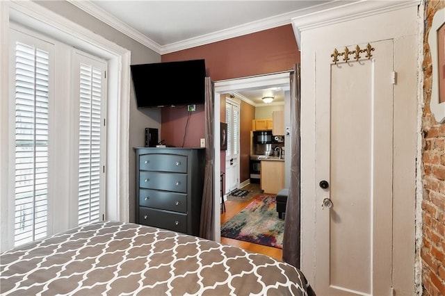 bedroom with ornamental molding