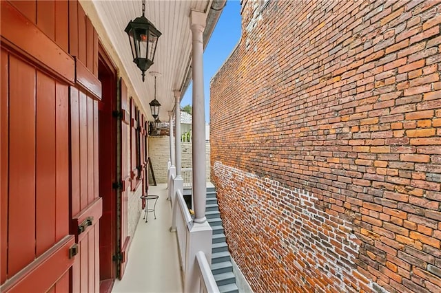 view of side of home with a porch