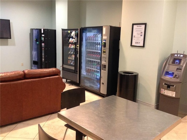 1205 St Charles Ave Unit 916, New Orleans, LA 70130 - living area featuring a bar and tile patterned floors