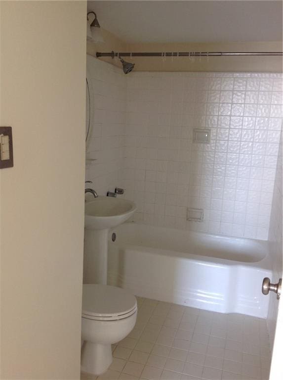 1205 St Charles Ave Unit 916, New Orleans, LA 70130 - full bathroom with tile patterned flooring and bathtub / shower combination