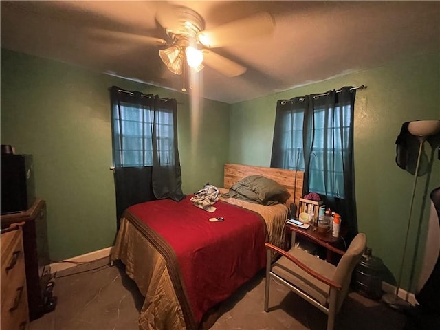 bedroom featuring ceiling fan