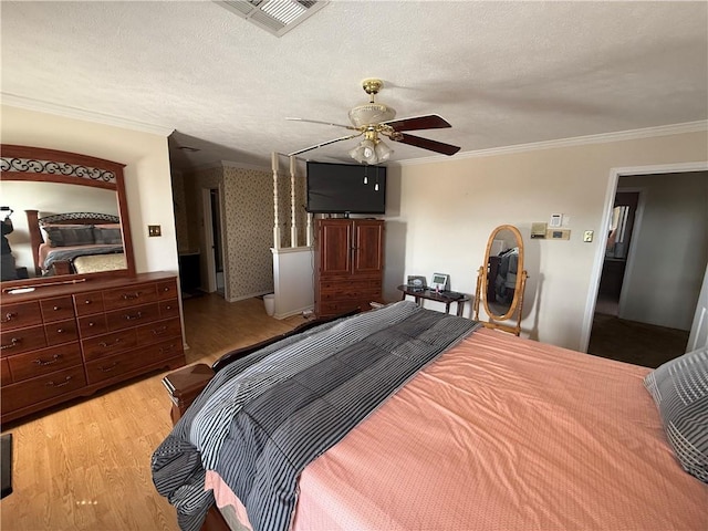 10923 Chaucer St, New Orleans, LA 70127 - bedroom with light wood finished floors, crown molding, and a ceiling fan