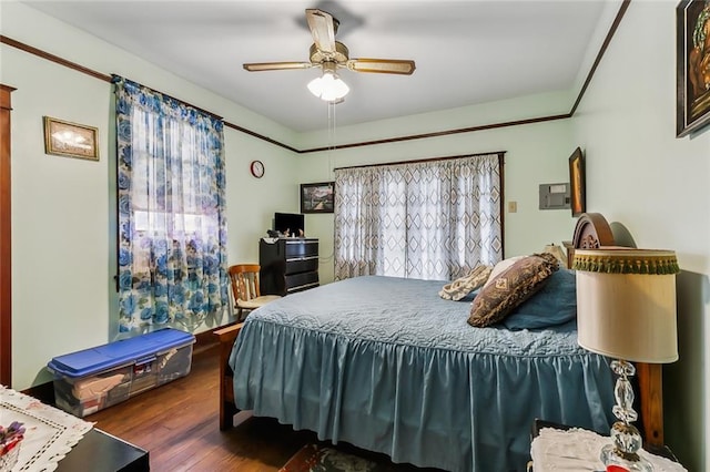 bedroom featuring ceiling fan and hardwood / wood-style flooring