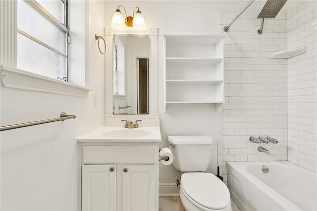 full bathroom featuring toilet, vanity, and tiled shower / bath combo