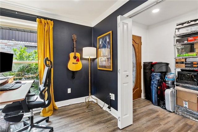 home office featuring hardwood / wood-style floors and crown molding