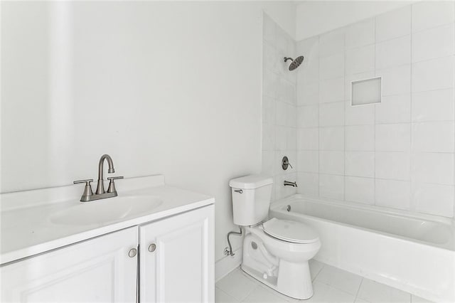 full bathroom with tile patterned flooring, vanity, tiled shower / bath combo, and toilet