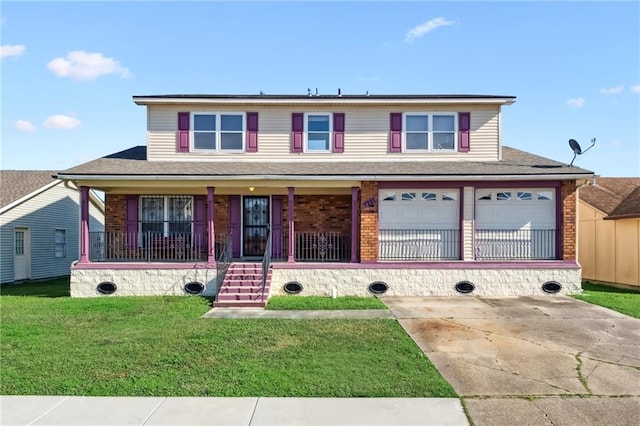 view of front of property with a garage, covered porch, and a front yard