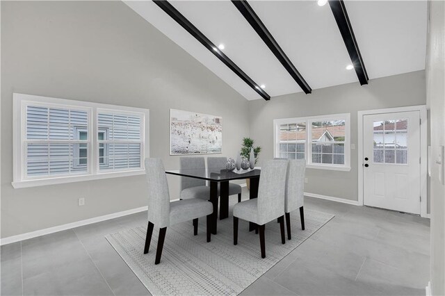 kitchen featuring light tile patterned flooring, appliances with stainless steel finishes, sink, and white cabinets