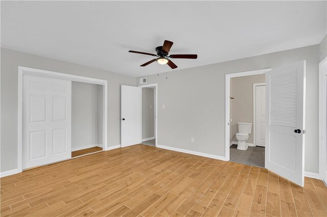 unfurnished room featuring ceiling fan and light hardwood / wood-style flooring