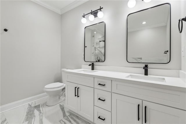 bathroom featuring vanity, toilet, and ornamental molding