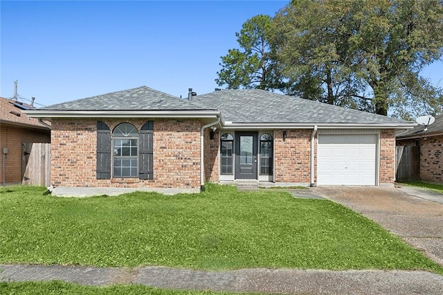 ranch-style house with a garage and a front yard