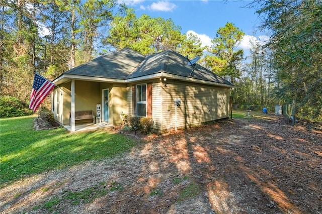 exterior space featuring a front lawn