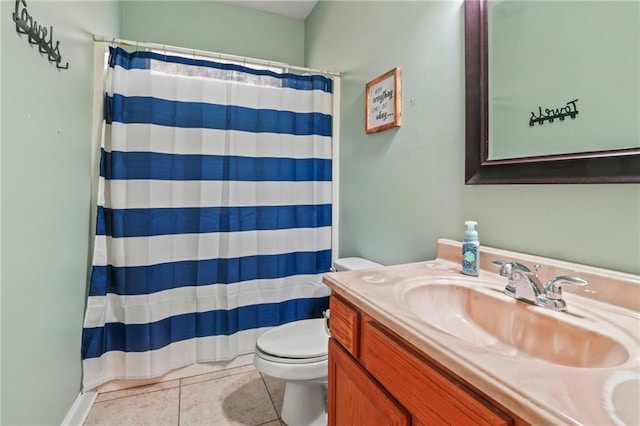 bathroom featuring tile patterned floors, vanity, toilet, and a shower with curtain