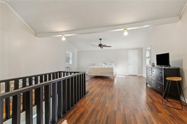 bedroom featuring lofted ceiling with beams and dark hardwood / wood-style flooring