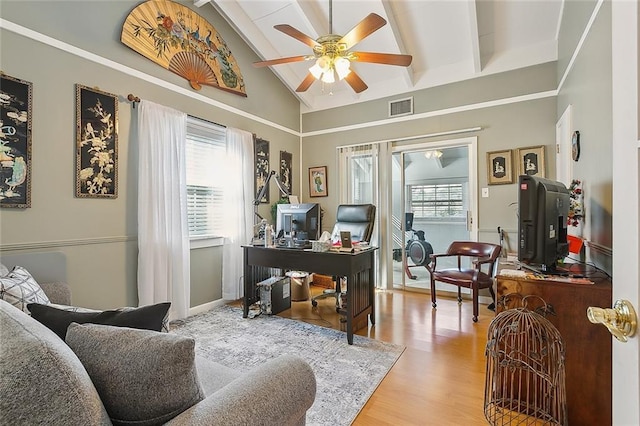 office space featuring vaulted ceiling with beams, light wood-type flooring, and ceiling fan