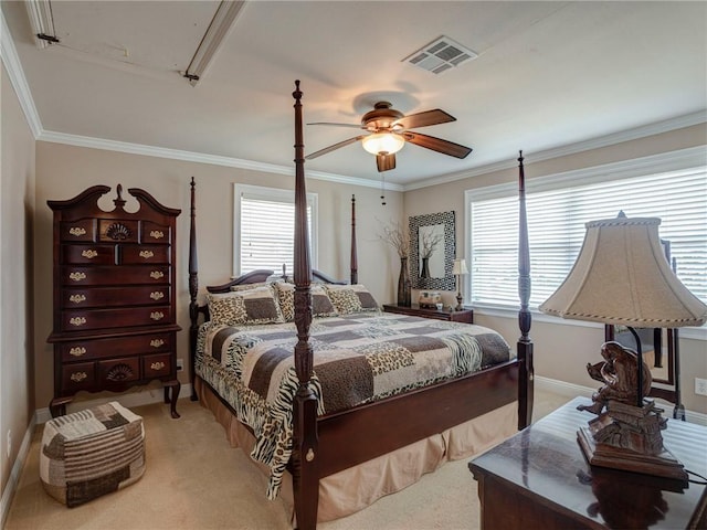 carpeted bedroom with ceiling fan, ornamental molding, and multiple windows