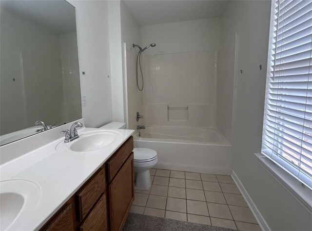 full bathroom featuring tile patterned flooring, vanity, bathing tub / shower combination, and toilet