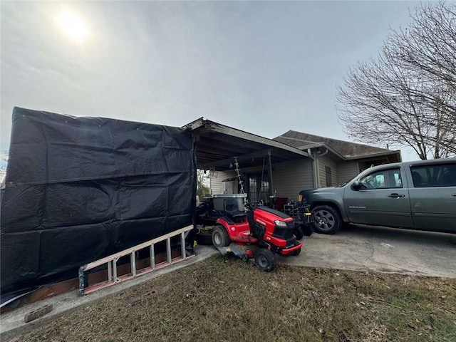 view of property exterior with a carport