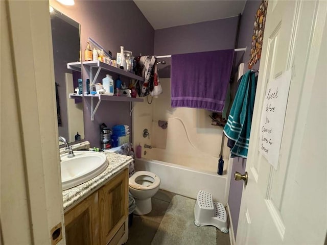 full bathroom with tile patterned floors, vanity, toilet, and shower / washtub combination