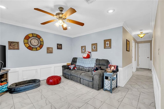 living room with ceiling fan and crown molding