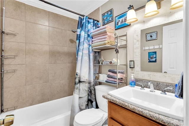 full bathroom featuring crown molding, vanity, shower / bath combination with curtain, and toilet