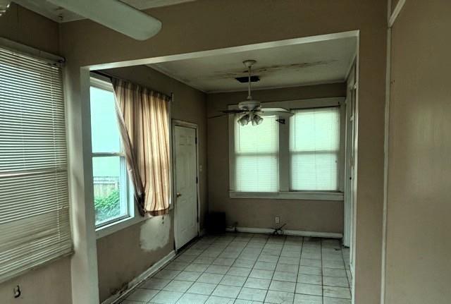 spare room featuring ceiling fan