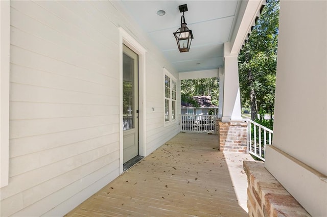 wooden terrace with covered porch