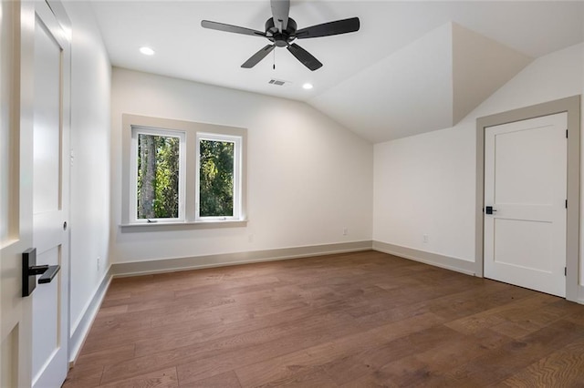 bonus room with recessed lighting, baseboards, lofted ceiling, and wood finished floors