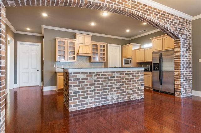326 Palmer Ct, Slidell, LA 70458 - kitchen featuring appliances with stainless steel finishes, dark wood-type flooring, glass insert cabinets, tasteful backsplash, and recessed lighting