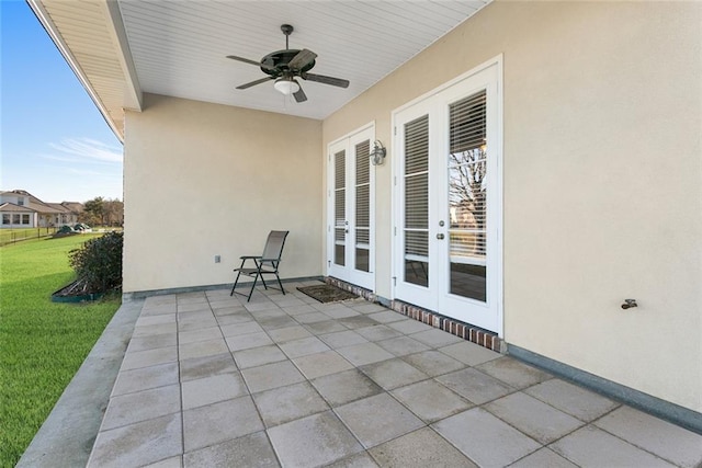 view of patio / terrace with ceiling fan and french doors