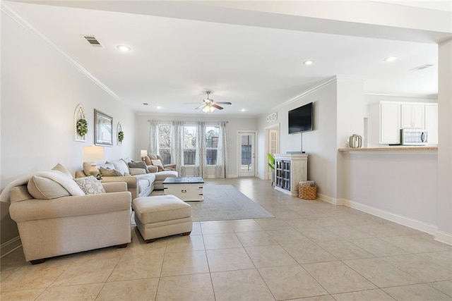 tiled living room featuring ceiling fan and crown molding