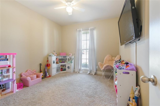 recreation room featuring carpet flooring and ceiling fan