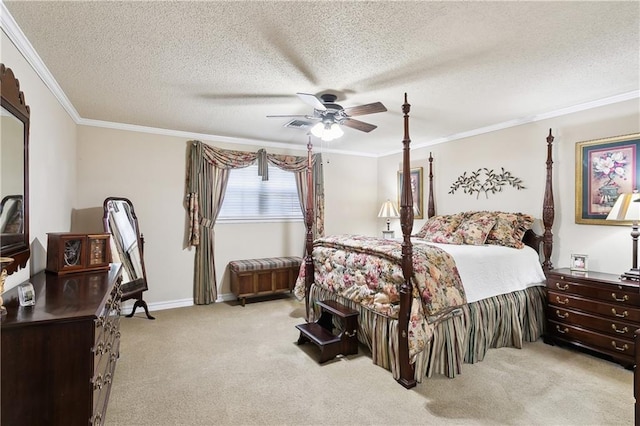 bedroom featuring ceiling fan, light colored carpet, a textured ceiling, and crown molding