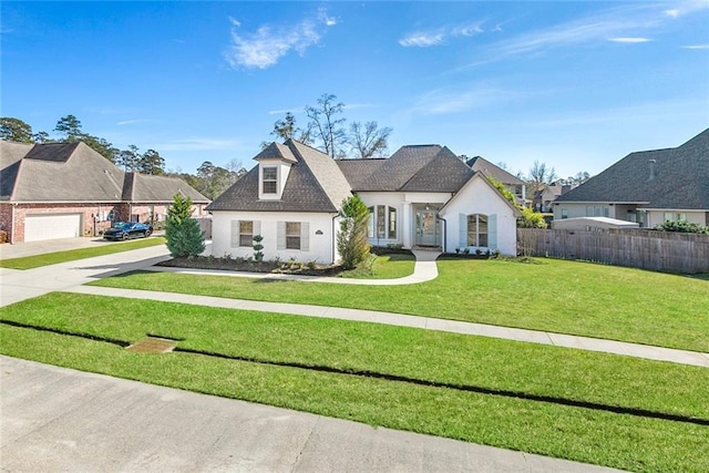 view of front of house with a front lawn