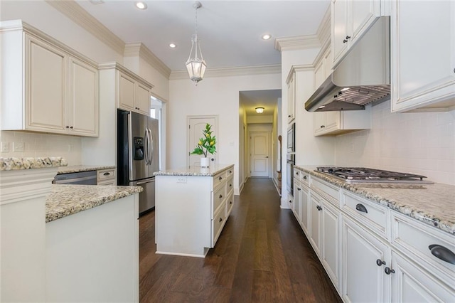 kitchen with decorative light fixtures, a center island, light stone countertops, and stainless steel appliances