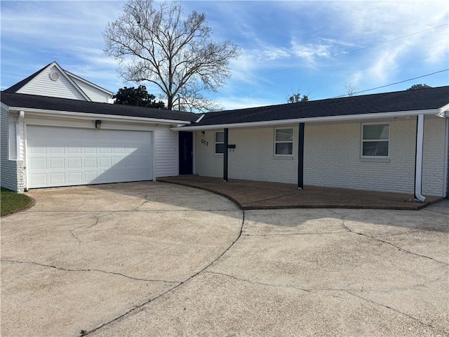 ranch-style home with a garage