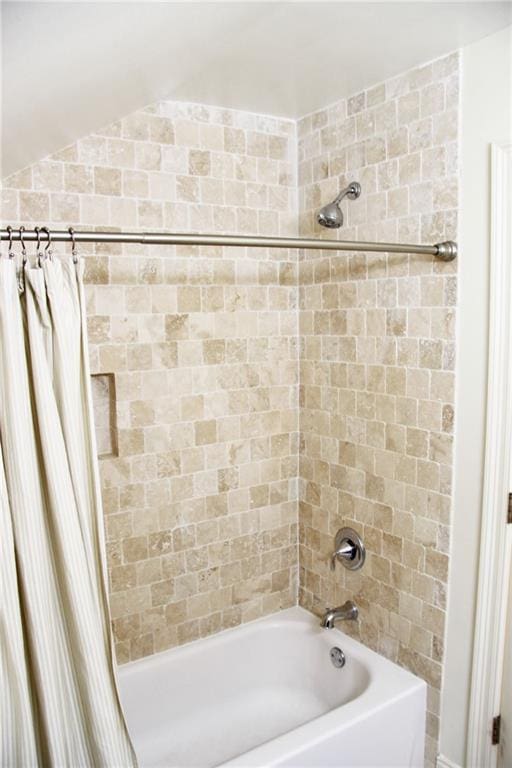 bathroom featuring shower / tub combo