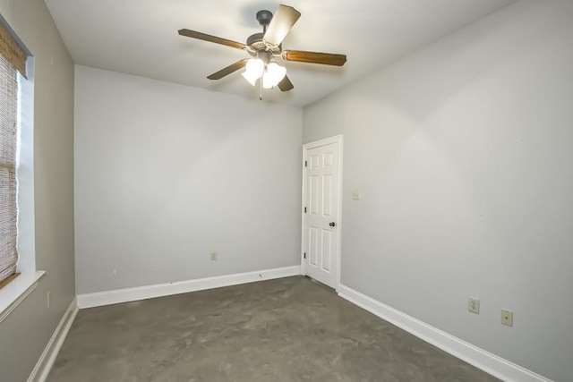 unfurnished room with ceiling fan